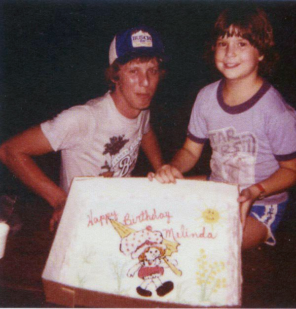 Me and my brother Roy, and my Strawberry Shortcake birthday cake on my 10th birthday in 1981. (also had on a Strawberry Shortcake wristwatch that you can barely see...and I still have it!).