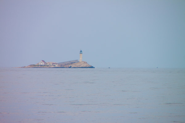 Lighthouse visible from our whale-watching ride with Granite State.
