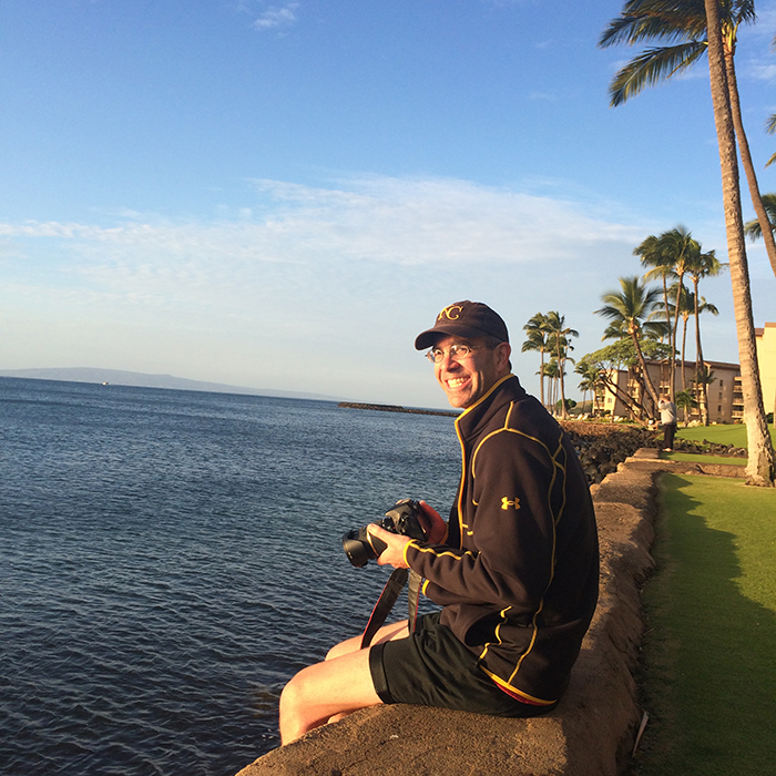 Lee near our Maui condo at sunrise, trying to capture photos of the green sea turtles.